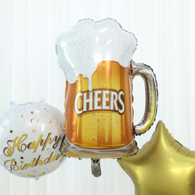 Beer mug balloon with "Cheers" text and additional birthday balloons