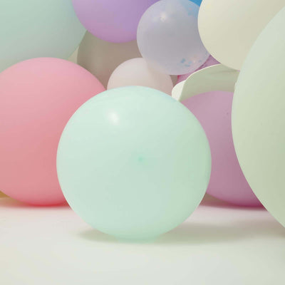 Pastel balloons in various colors, including a mint green balloon.