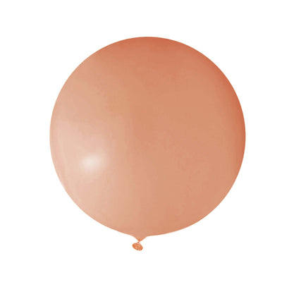 Peach-colored balloon on a white background