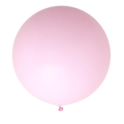 Pink balloon on a plain backdrop
