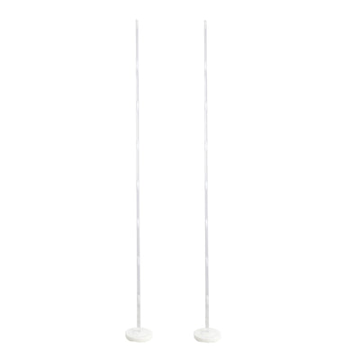 Clear acrylic display poles with round bases for showcasing items.