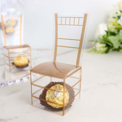 Gold chair-shaped candy box with chocolate, clear design.