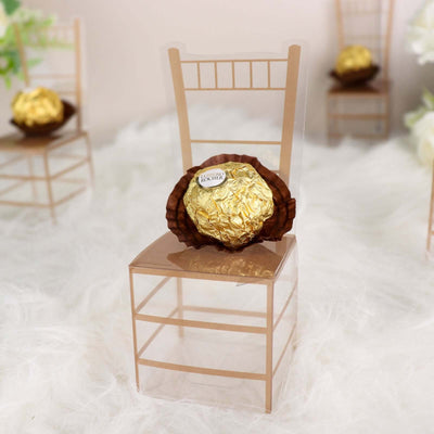 Chocolate truffle on a decorative chair-shaped display