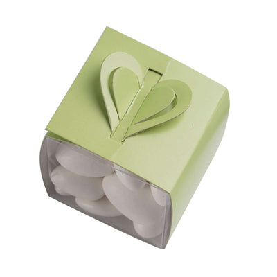 Green heart-shaped gift box with white chocolates inside