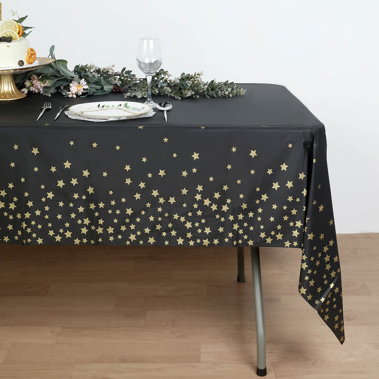 108 Inch Stars Sprinkled Plastic Tablecloth Waterproof Rectangle Black And Gold