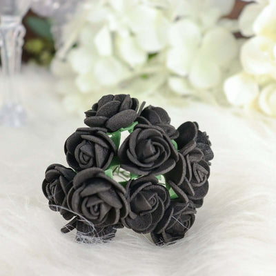 Black rose hair accessory with multiple flowers arranged elegantly.