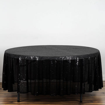Elevate Your Event with the Black Seamless Premium Sequin Round Tablecloth 108"