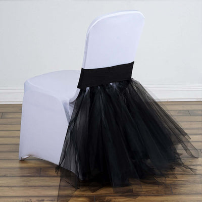 Elegant white chair cover with black tulle skirt, perfect for event decoration.