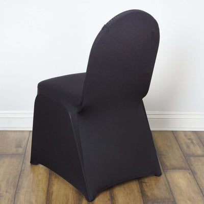 Black chair cover on a simple chair against a plain background.