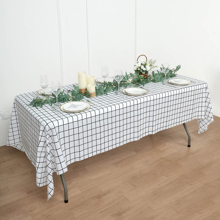 54 Inch x 108 Inch Checkered Plastic Tablecloth In Black And White Waterproof Disposable