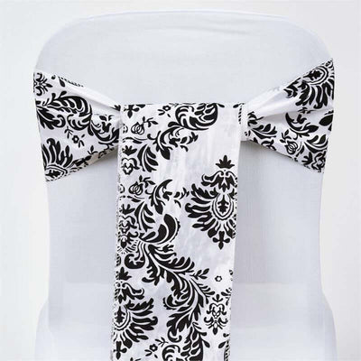 Black and white patterned chair sash on a white chair