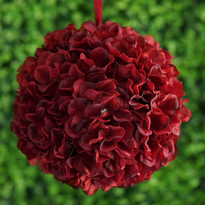 Red floral ball decoration for events or home decor.