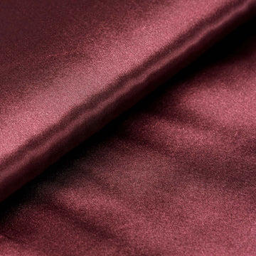 Elevate Your Events with Burgundy Satin Fabric