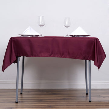 Add Elegance to Your Event with the Burgundy Square Seamless Polyester Tablecloth