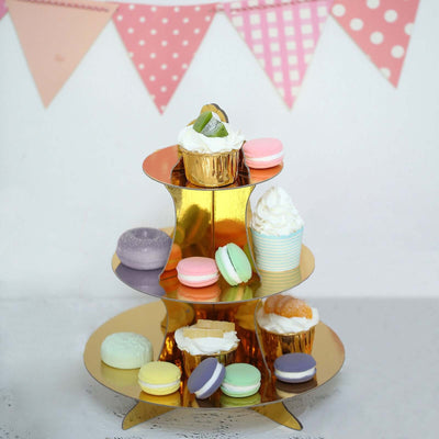 Gold dessert stand with colorful cupcakes and macarons, perfect for celebrations.