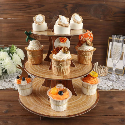 Decorative cupcake display with assorted themed cupcakes on a wooden stand.