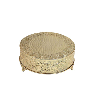 Decorative gold round box with intricate floral engravings