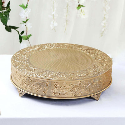 Gold decorative cake stand with intricate floral designs