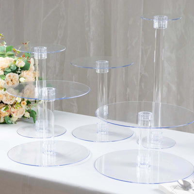 Acrylic display stands in various sizes arranged on a table