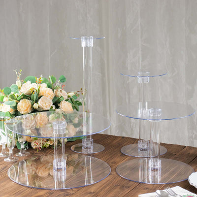 Acrylic dessert stands in three heights with a floral centerpiece.