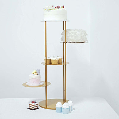 Stylish gold cake stand with various desserts arranged on it