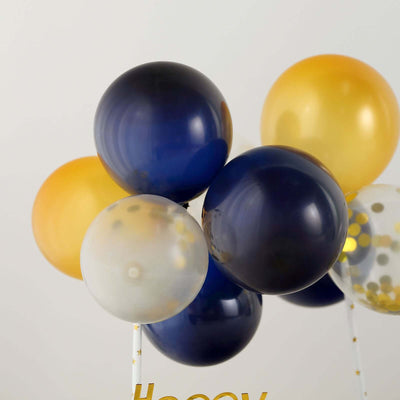 Colorful balloon bouquet with navy, gold, and clear balloons