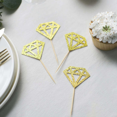 Gold glitter diamond cake toppers for festive celebrations.
