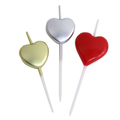 Heart-shaped cake toppers in red, gold, and silver on a white background.
