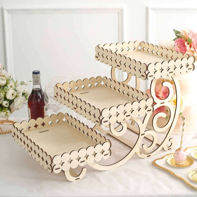Three-tier wooden serving stand with decorative scalloped edges.