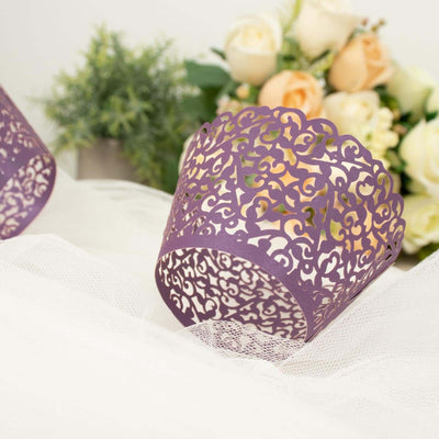 Purple lace cupcake wrapper on a textured surface with floral background.