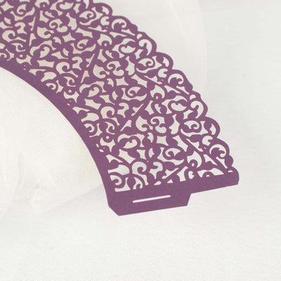 Purple lace paper doily with intricate cutout design.
