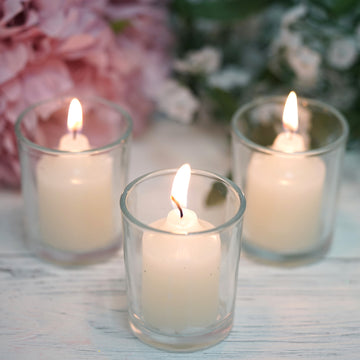 Create a Warm and Exotic Ambiance with the 12 Pack Ivory Votive Candle and Clear Glass Votive Holder Candle Set