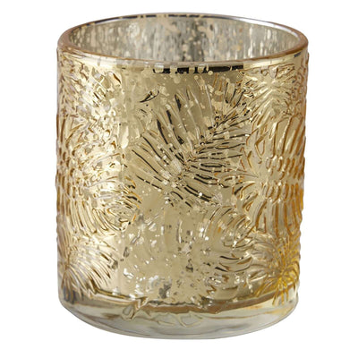 Gold decorative candle holder with intricate floral design.