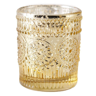Gold decorative glass candle holder with intricate embossed design.