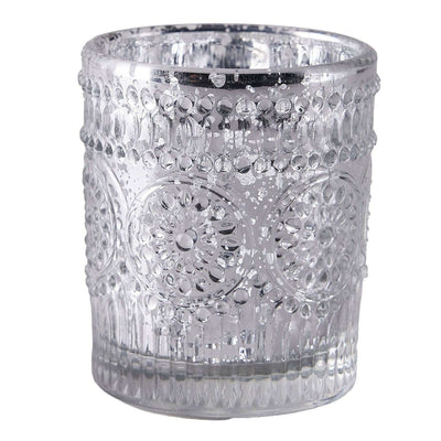 Mercury glass candle holder with intricate design and reflective surface