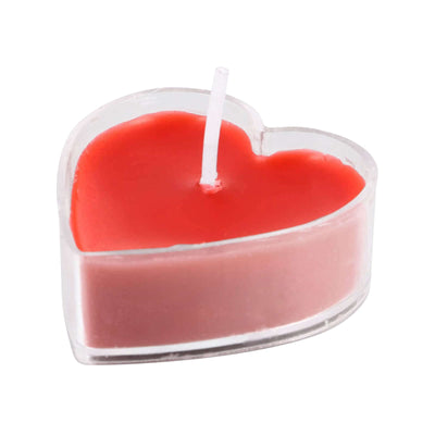 Heart-shaped scented candle in clear holder
