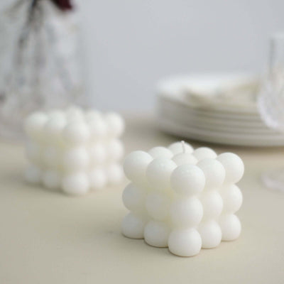 White bubble candle in a modern design, perfect for home decor.