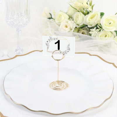 Elegant table number holder with floral design, perfect for weddings and events.