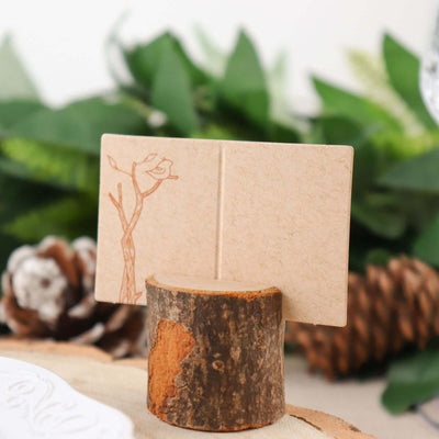 Natural wood card holder with tree design, ideal for table settings.