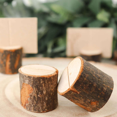 Wooden log slices with natural bark for rustic decor or crafting.