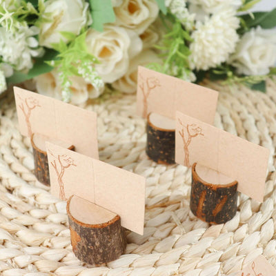 Wooden card holders with tree design, perfect for table settings.