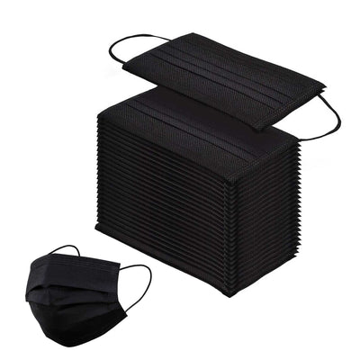 Black disposable face masks stacked on a white background.