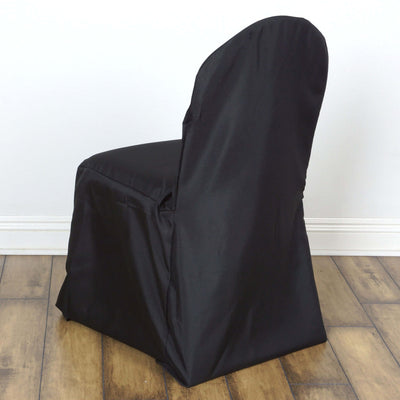 Black chair cover for event or home use, providing an elegant touch.