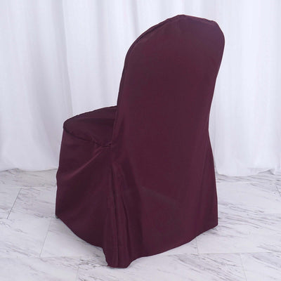 Burgundy chair cover, elegantly draped for formal events.