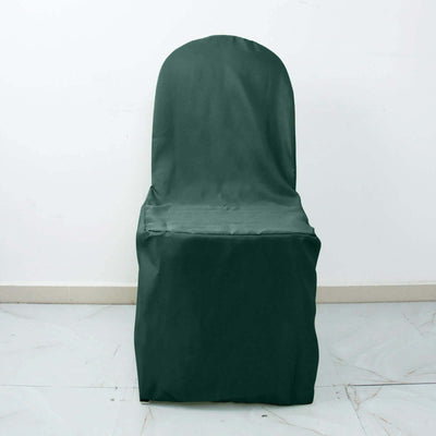 Green chair cover on a plain backdrop