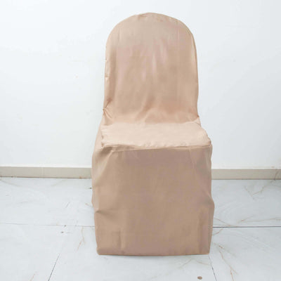Beige chair cover on a plain backdrop for furniture protection.