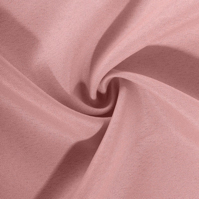 Pink textured fabric in a swirl pattern.