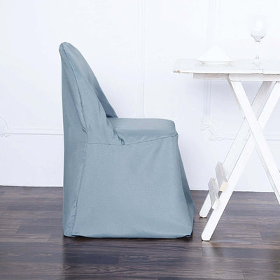 Side view of a gray chair cover on a wooden chair.