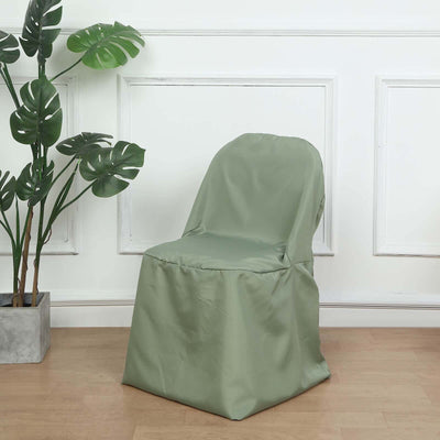 Green chair cover on a chair in a styled room setting.