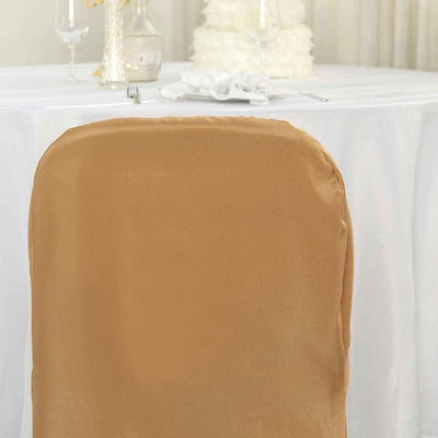 Gold chair cover on a banquet table setting.
